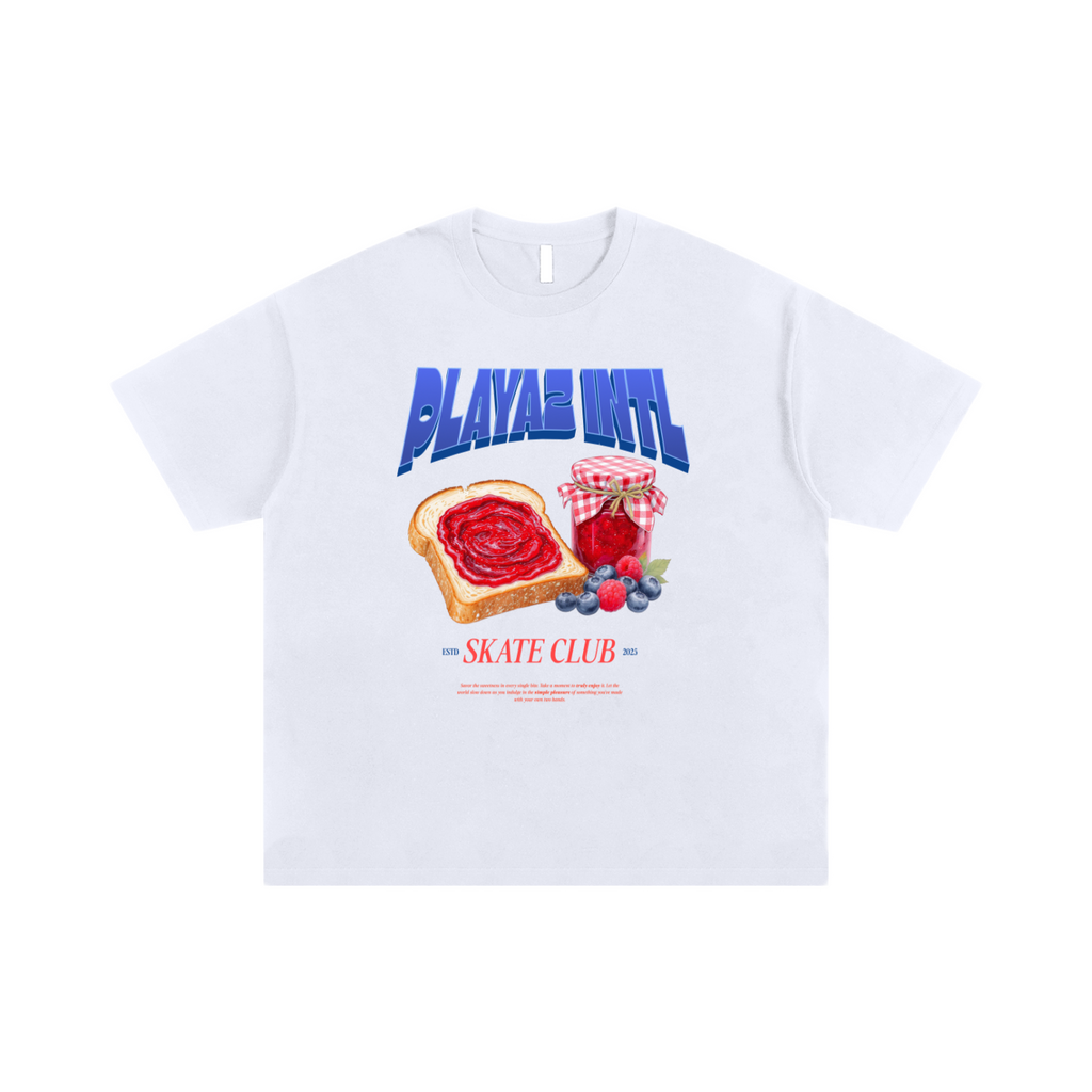 White t-shirt with graphic design of toast, jelly, and a jar of jam on a white background