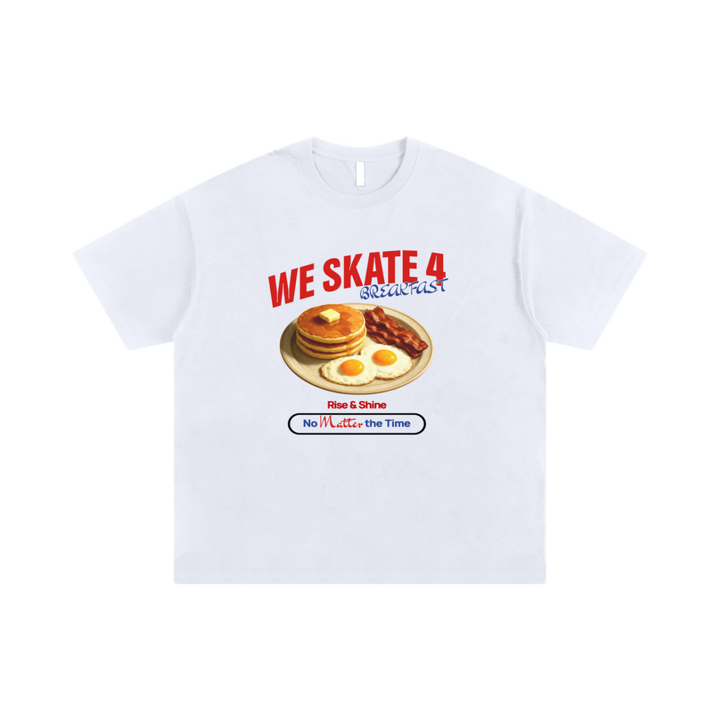 White t-shirt with a graphic of pancakes and eggs, text on a white background